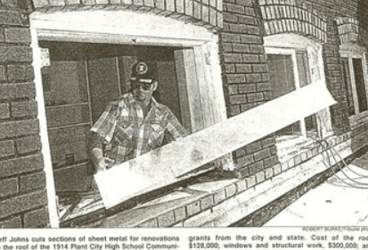 Jeff Johns In Newspaper installing Sheet Metal on the Old Plant City Court House.