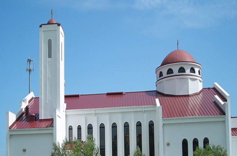 Church with Red Standing Seam Metal Roof