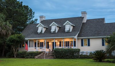 Beautiful home lit up at twilight.